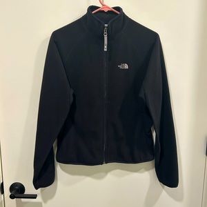 The North Face black Polartec fleece base layer, size M.